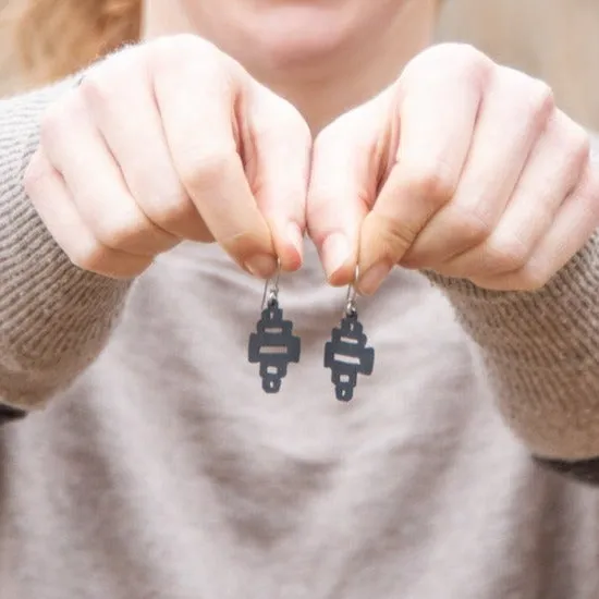 wcc tiny rubber earring